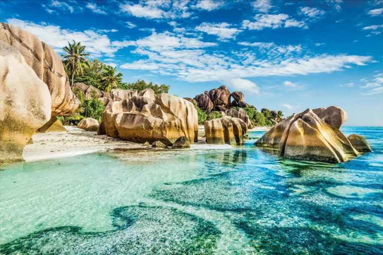 Africa cruise destination featuring tropical coastline, turquoise waters and granite rock formations