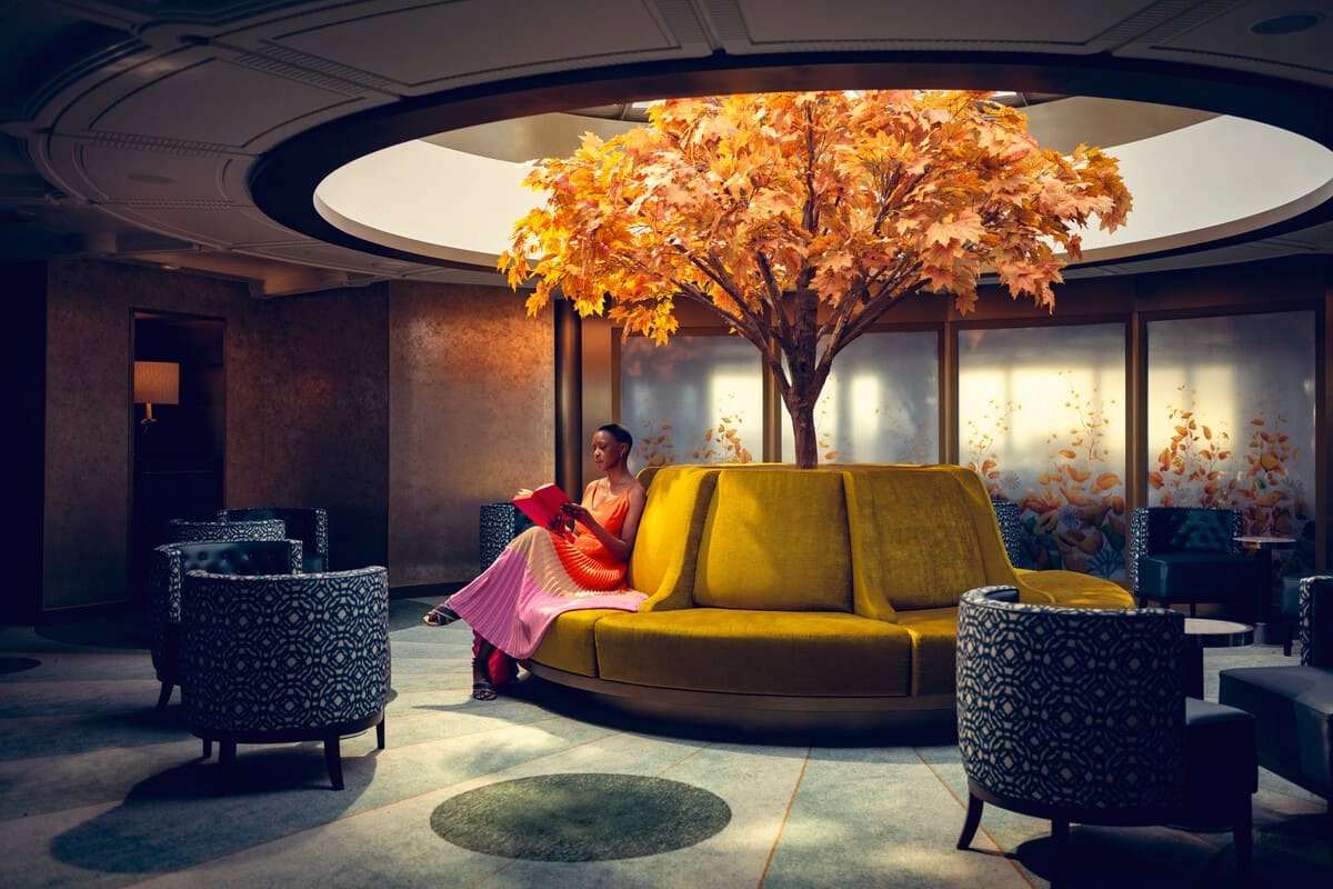 Elegant lounge aboard a Cunard cruise ship featuring luxurious interiors and sophisticated design for an unforgettable voyage.
