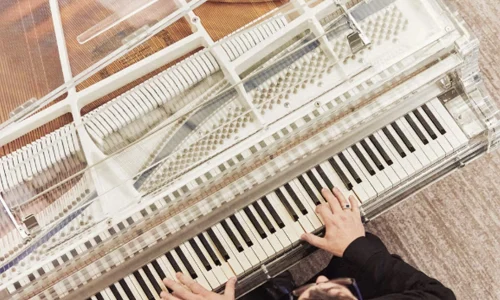 Grand piano performance during live entertainment aboard a Crystal Cruises ship.