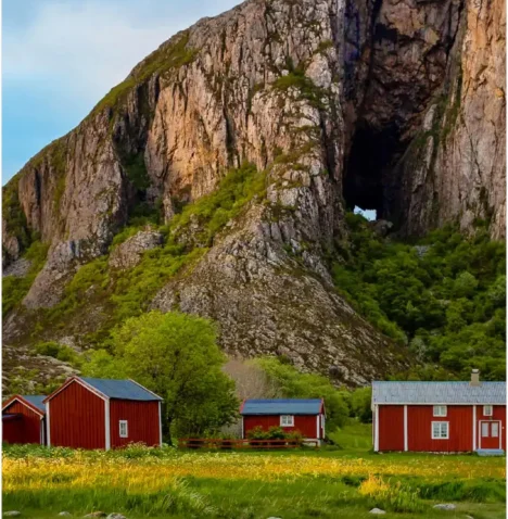 Hurtigruten small ship sailing through Norway’s rugged coastline, dramatic cliffs, and picturesque coastal villages. Hurtigruten small ship sailing through Norway's rugged coastline, dramatic cliffs, and picturesque coastal villages.